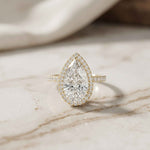 3.9 Ct Pear Cut Moissanite Halo Ring with Accent Stones