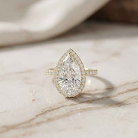 3.9 Ct Pear Cut Moissanite Halo Ring with Accent Stones