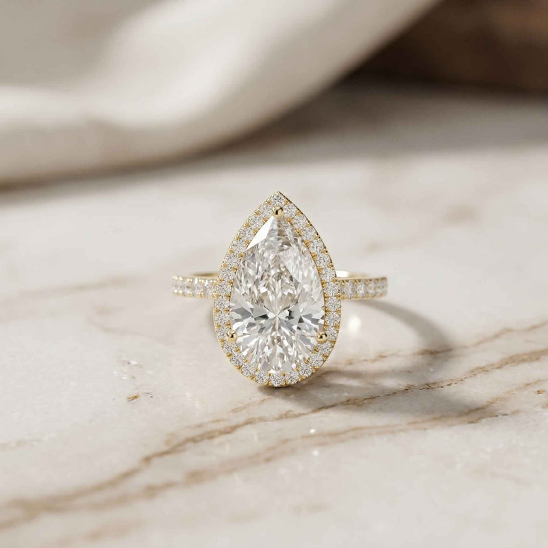 3.9 Ct Pear Cut Moissanite Halo Ring with Accent Stones