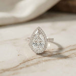 3.9 Ct Pear Cut Moissanite Halo Ring with Accent Stones