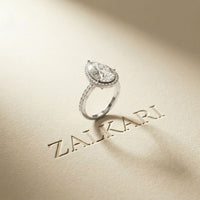 3.9 Ct Pear Cut Moissanite Halo Ring with Accent Stones