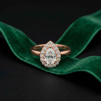 0.71 Ct Pear & Round Moissanite Halo Ring