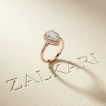 0.71 Ct Pear & Round Moissanite Halo Ring