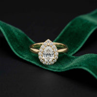 0.71 Ct Pear & Round Moissanite Halo Ring