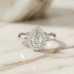 0.71 Ct Pear & Round Moissanite Halo Ring