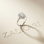 0.71 Ct Pear & Round Moissanite Halo Ring