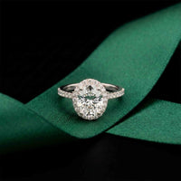 2.48 Ct Oval Cut Hidden Halo Cathedral Shank Moissanite Ring