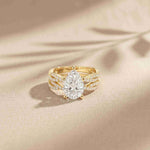 3.25 Ct Pear Cut Moissanite Crisscross Pavé Ring