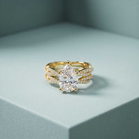 3.25 Ct Pear Cut Moissanite Crisscross Pavé Ring