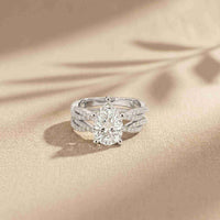 3.25 Ct Pear Cut Moissanite Crisscross Pavé Ring