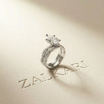 3.25 Ct Pear Cut Moissanite Crisscross Pavé Ring
