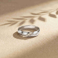0.07 Ct Round Cut Criss-Cross Accent Moissanite Ring