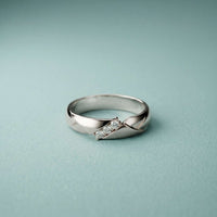 0.07 Ct Round Cut Criss-Cross Accent Moissanite Ring