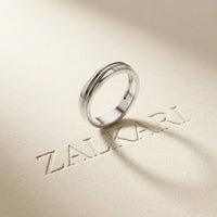 0.04 Ct Round Cut Grooved Comfort Band Moissanite Ring