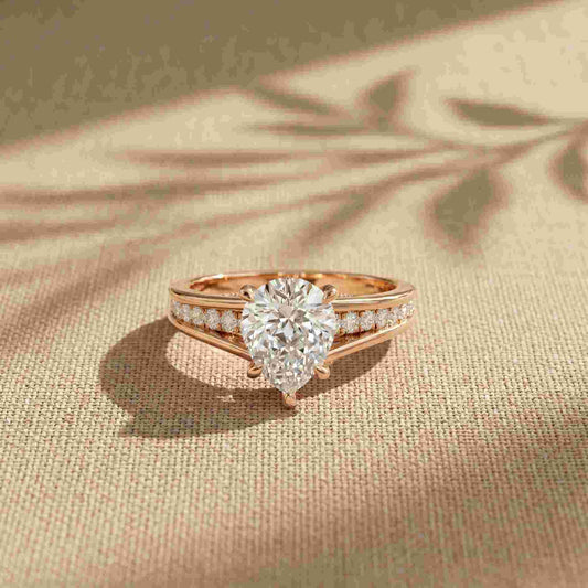 2.30 Ct Pear Cut Moissanite Tapered Pavé Engagement Ring