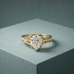 2.30 Ct Pear Cut Moissanite Tapered Pavé Engagement Ring
