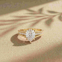 2.30 Ct Pear Cut Moissanite Tapered Pavé Engagement Ring