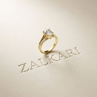 2.30 Ct Pear Cut Moissanite Tapered Pavé Engagement Ring