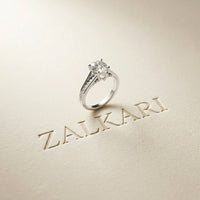 2.30 Ct Pear Cut Moissanite Tapered Pavé Engagement Ring