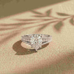 2.30 Ct Pear Cut Moissanite Tapered Pavé Engagement Ring