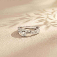 0.70 Ct Round Cut Moissanite Criss Cross Pavé Ring