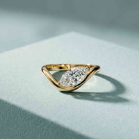0.87 Ct Marquise Cut Moissanite Curved Shank Ring