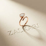 1.25 Ct Pear Cut Moissanite Bezel Solitaire Ring Rose Gold
