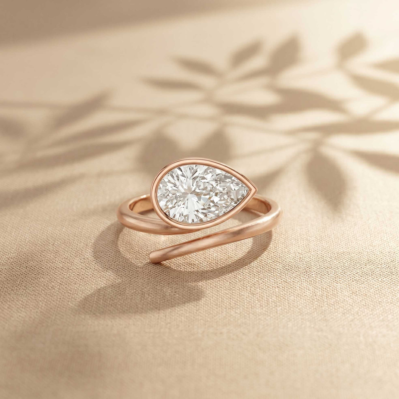 1.25 Ct Pear Cut Moissanite Bezel Solitaire Ring Rose Gold