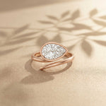 1.25 Ct Pear Cut Moissanite Bezel Solitaire Ring Rose Gold