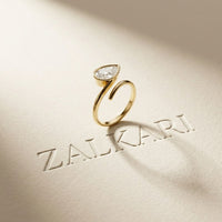 1.25 Ct Pear Cut Moissanite Bezel Solitaire Ring Gold