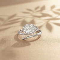 1.25 Ct Pear Cut Moissanite Bezel Solitaire Ring White