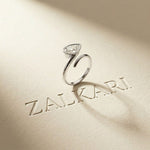 1.25 Ct Pear Cut Moissanite Bezel Solitaire Ring White