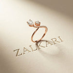 0.90 Ct Pear & Round Cut Moissanite Bypass Toi et Moi Ring