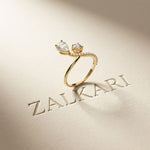 0.90 Ct Pear & Round Cut Moissanite Bypass Toi et Moi Ring
