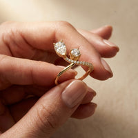 0.90 Ct Pear & Round Cut Moissanite Bypass Toi et Moi Ring