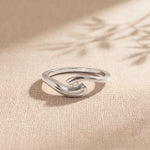 0.10 Ct Round Cut Modern Open Swirl Moissanite Ring White
