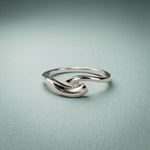0.10 Ct Round Cut Modern Open Swirl Moissanite Ring White
