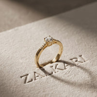 0.30 Ct Round Cut Moissanite Tapered Pavé Solitaire Ring for Women Gold