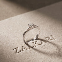 0.30 Ct Round Cut Moissanite Tapered Pavé Solitaire Ring for Women White