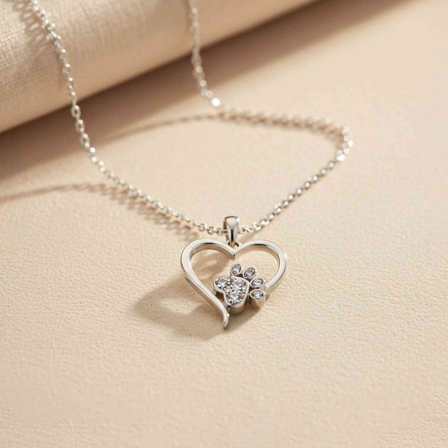 Silver Dog Paw Heart Shaped Pendant