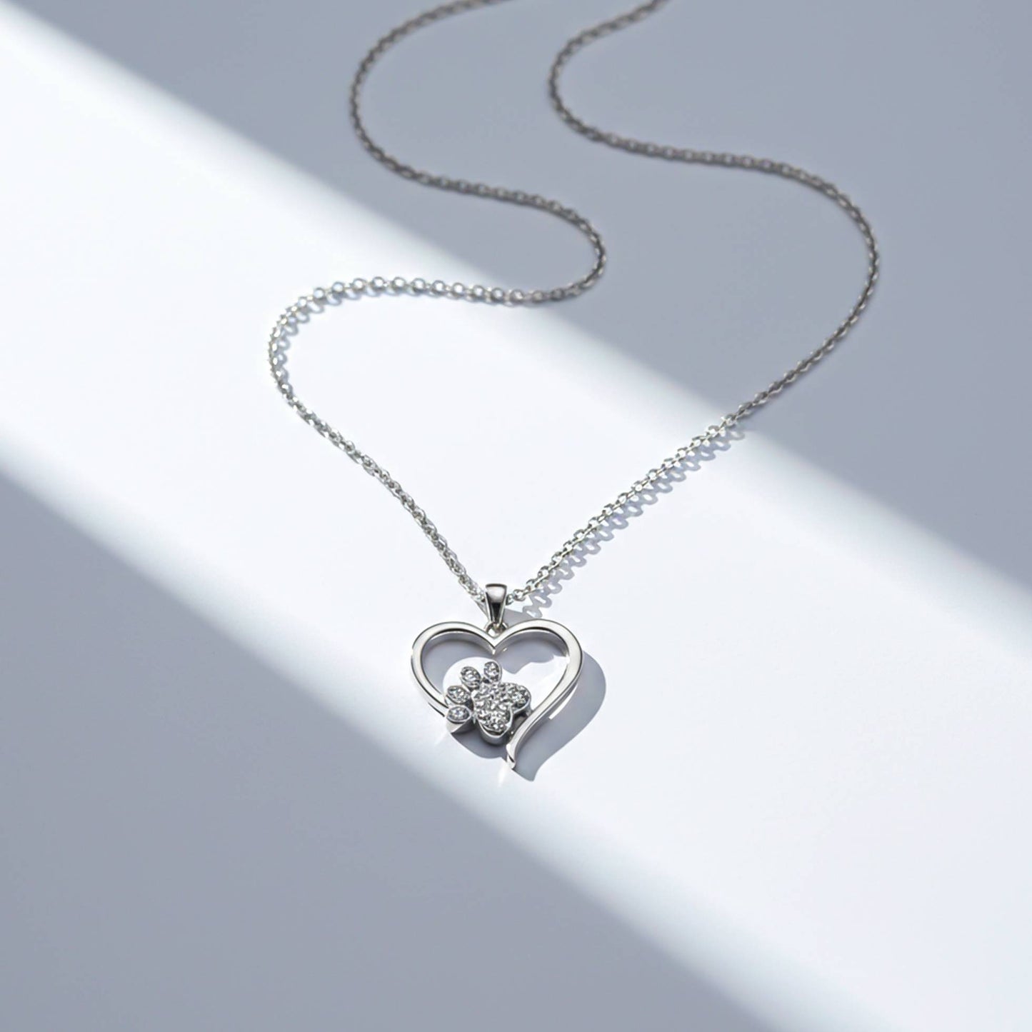 Silver Dog Paw Heart Shaped Pendant