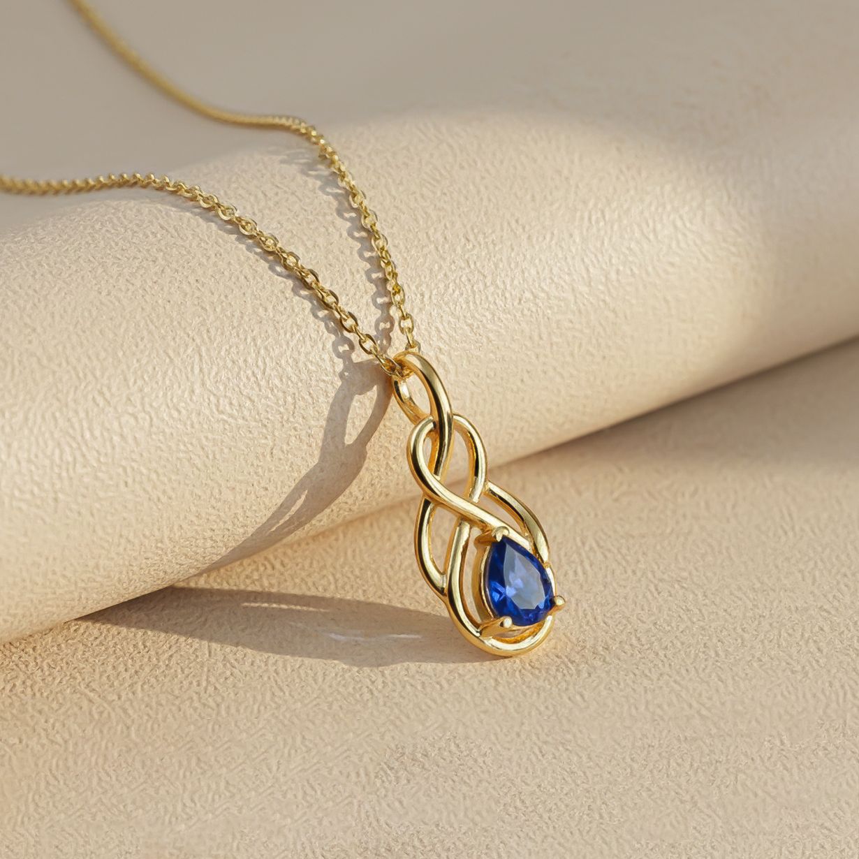 Silver Sapphire Infinity knot Pendant Gold Vermeil (2.5 Micron)