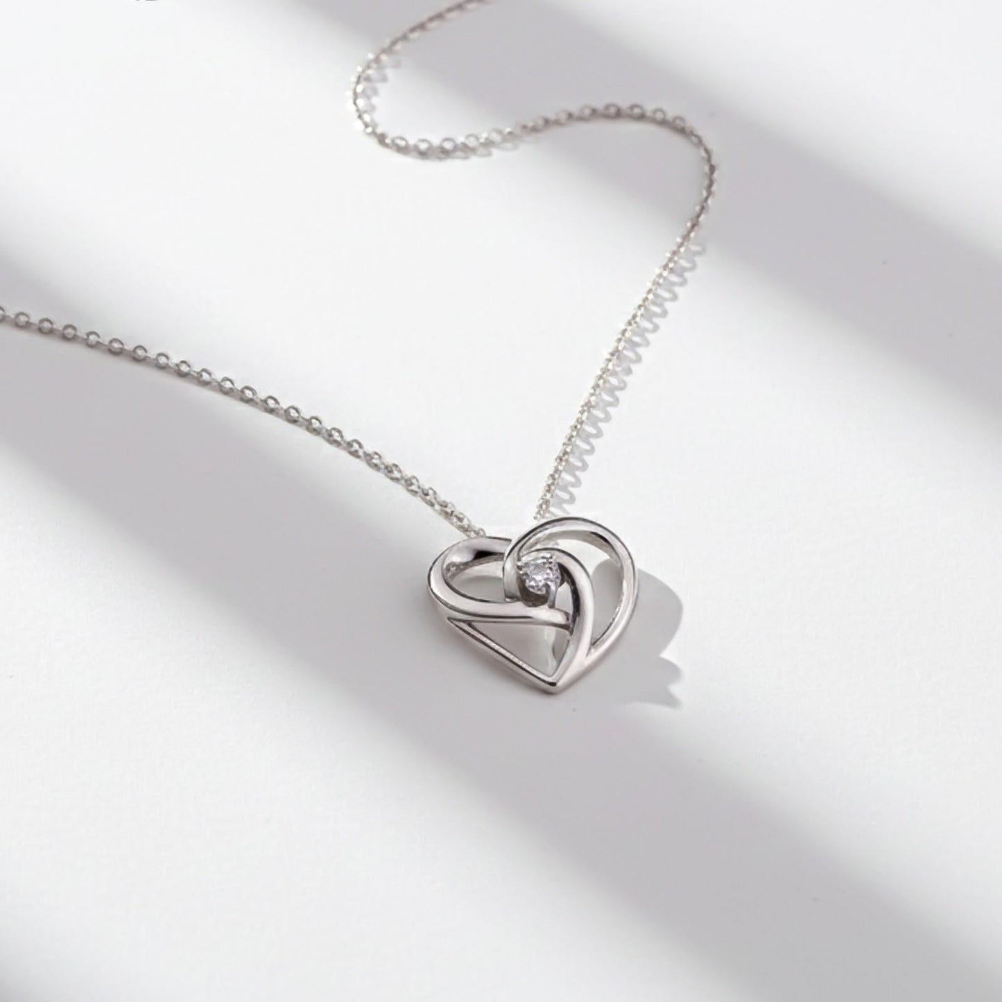 Silver Double Heart Twist Pendant & Earrings Set