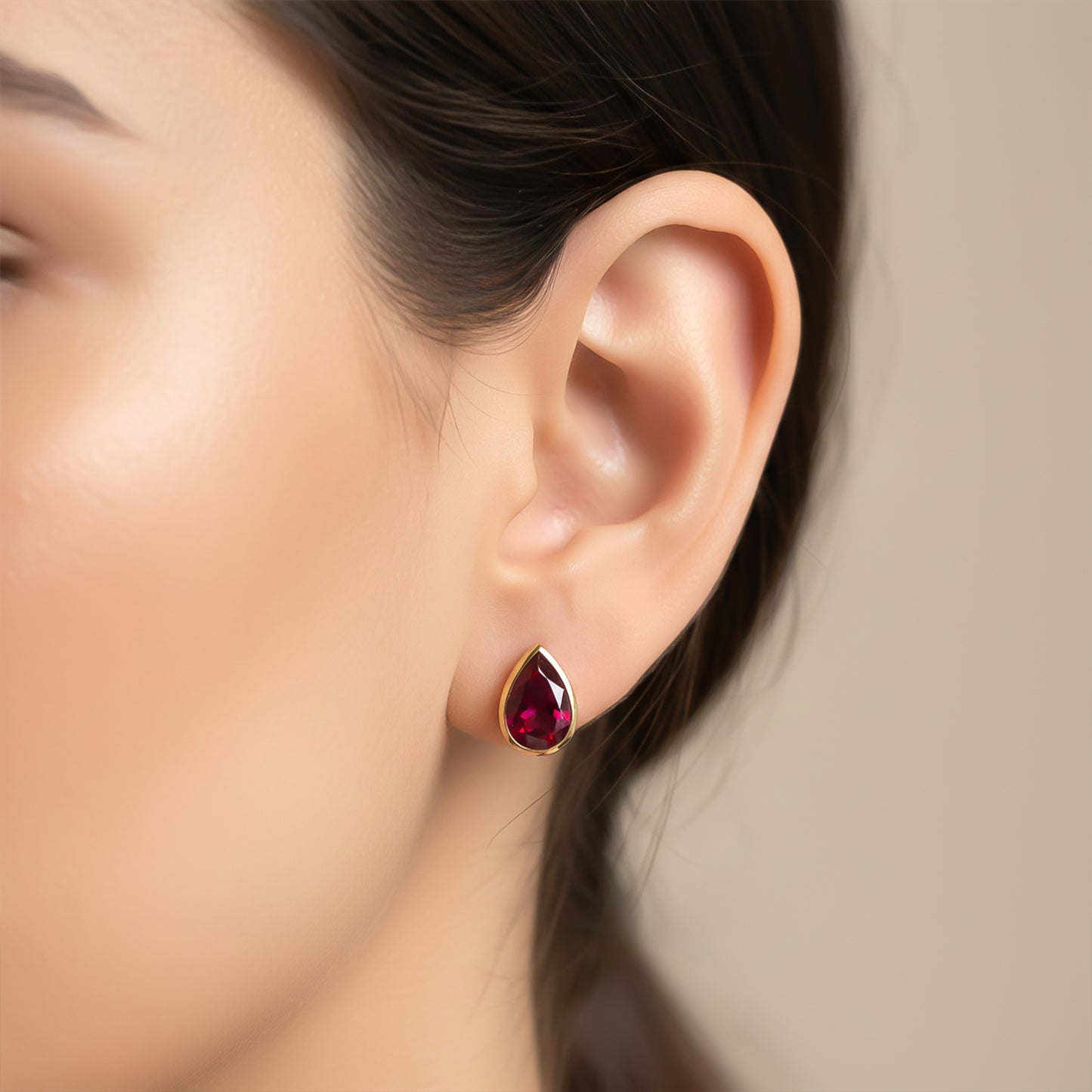 Golden Pear Shape Ruby Stud Earrings